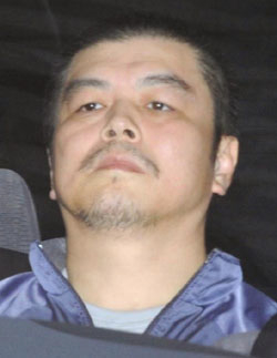 Такеши Коизуми после задержания